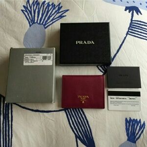 Prada Saffiano Leather Bifold Wallet in Deep Berry Red with Gold Logo